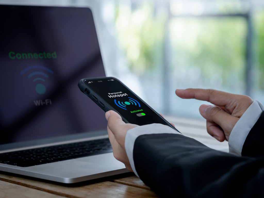 Hotspot failover to reduce downtime Laptop connects through a phone hotspot as a temporary internet failover.